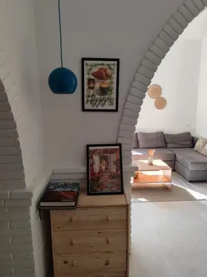 a living room with a couch and a coffee table at Apartment in Premia de Dalt