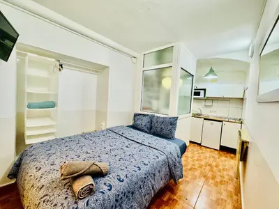 a bedroom with a bed with a towel on it at 044 Velvet 1 3 in Barcelona