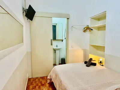 a bedroom with a bed and a sink in it at 044 Velvet 1 3 in Barcelona