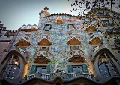 a building with a mural on the side of it at Lets Holidays Apartment Sea Views in Barcelona in Barcelona