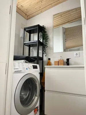 a kitchen with a washing machine in a kitchen at Holiday Beach Home Rincón del Mar in Cunit