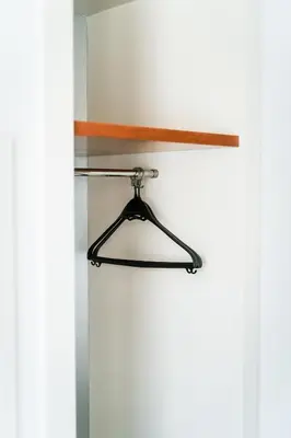 a glass shelf on a white wall at AS Porta de Barcelona in Castellbisbal