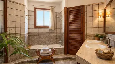 a bedroom with a bed in a room with a window at Villa Abu Lita 3 minutos andando playa Renovada Piscina y Jardin XXL Autentico lujo in Sitges