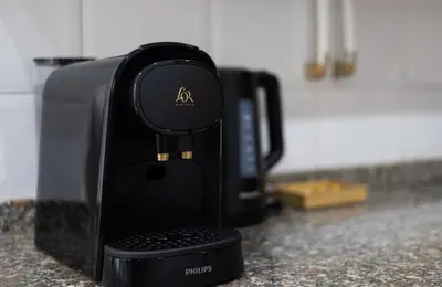 a coffeemaker sitting on a counter in a kitchen at Stay U-nique Apartments Sant Nicolau in Barcelona