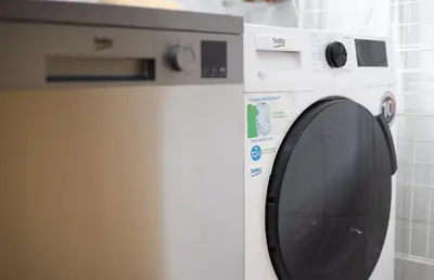 a white washing machine in a bathroom at Stay U-nique Apartments Sant Nicolau in Barcelona