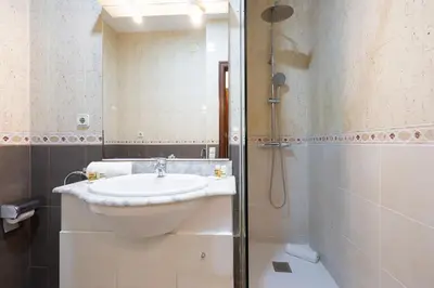 a bathroom with a sink and a shower at Stay U-nique Apartments Sant Nicolau in Barcelona