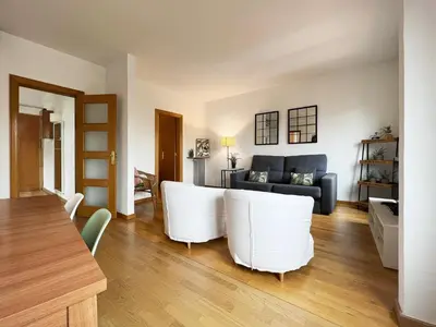 a living room with white chairs and a couch at Stay U-nique Apartments Rambla Catalunya in Barcelona