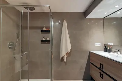 a bathroom with a shower and a sink at Casa Lennon in Barcelona