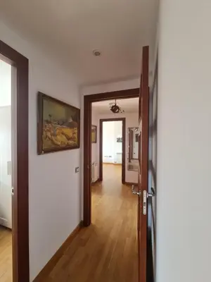 an empty room with a door and a hallway at Pis molt cèntric amb vistes in Terrassa