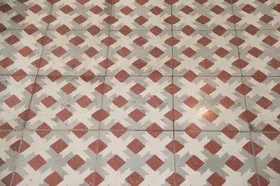 a tiled floor with red and white tiles at Canela Homes BARCELONA CONCEPCIÓ in Barcelona