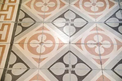 a tile floor with a pattern on it at Canela Homes BARCELONA CONCEPCIÓ in Barcelona