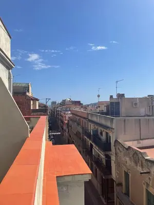 a view of a city from the roof of a building at Urban Flats Park Guell in Barcelona