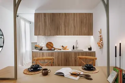 a kitchen with a desk and two chairs at Olivo - 1 bedroom and terrace in Eixample Esquerra in Barcelona