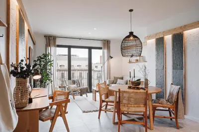 a bedroom with a bed with two lamps at Ferrat - 3 bedrooms in Eixample Esquerra in Barcelona