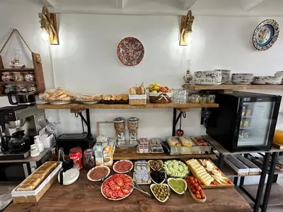 a bakery with a bunch of different types of food at Vilador Barcelona Beach Hotel in Masnou