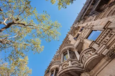 a tall building with a window on the side of it at Sweett - La Gran Via in Barcelona