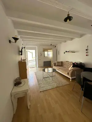 a living room with a couch and a table at Vista Alegre Casa Rest House in Vallromanas