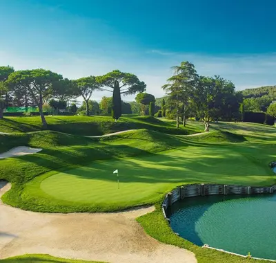 an overhead view of a golf course with a pond at Vista Alegre Casa Rest House in Vallromanas