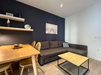 a living room with a couch and a table at Stay U-nique Apartments Rossello in Barcelona