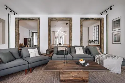 a dining room with a glass table and chairs at Zuheros - 2 bedrooms in Eixample Dreta in Barcelona