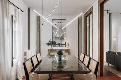 a living room with a couch and a coffee table at Zuheros - 2 bedrooms in Eixample Dreta in Barcelona