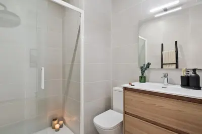 a bedroom with a bed and a window at Vietri - 2 bedrooms and terrace in Sant Antoni in Barcelona