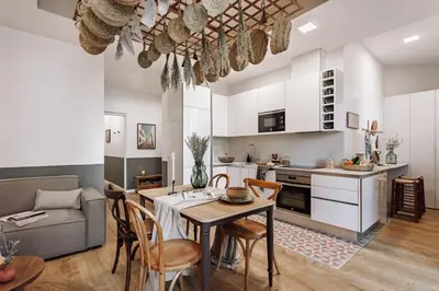 a bedroom with a brick wall and a bed and a table at Aroche - 2 bedrooms in Sant Antoni in Barcelona