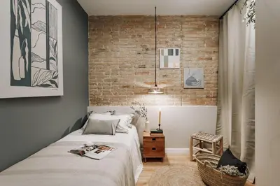 a kitchen and living room with a table and chairs at Aroche - 2 bedrooms in Sant Antoni in Barcelona