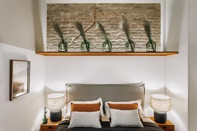 a room with a table and a large window at Aroche - 2 bedrooms in Sant Antoni in Barcelona