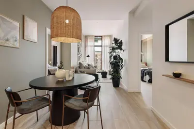 a bedroom with a bed and a desk and a table at Miravet - 2 bedrooms in Sant Antoni in Barcelona