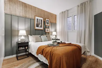 a white bathroom with a sink and a shower at Loja - 2 bedrooms in Sant Antoni in Barcelona