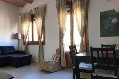 a living room with a couch and a table at Gracia Travesera 2 Bedrooms Renovated Apartment in Barcelona