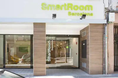 a store front with a sign for a shopping mall at SmartRoom Barcelona in Barcelona