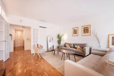 a living room with a couch and a table at Sweett - Nova Icaria Beach in Barcelona