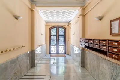 an empty hallway with a door in a building at Canela Homes BARCELONA PATIO in Barcelona