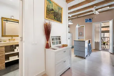 a kitchen with a sink and a counter top at Sunny Retro Flat Balcony in Poble Sec in Barcelona