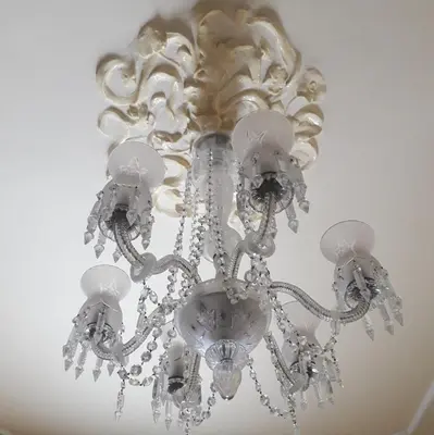 a chandelier hanging from a ceiling at Hotel Noucentista in Sitges