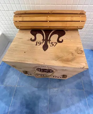 a wooden box sitting on top of a floor at Barcelona Raval in Barcelona