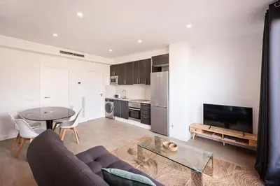 a living room with a couch and a table at Sweett - Harmony Central in Barcelona