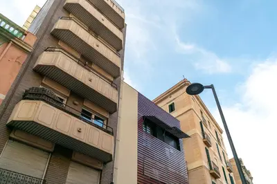 a building with balconies on the side of it at 