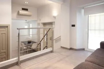 a living room with a couch and a table at Barceloneta Apartment in Barcelona