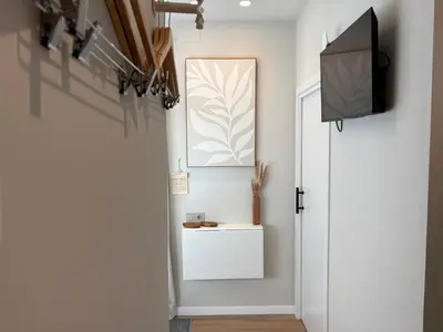 a bedroom with a star decoration on the wall at Montroig 5 hotel boutique in Sitges
