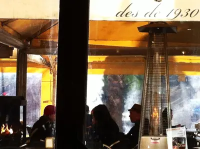 a group of people sitting in a store window at The Hotel 592 - Adults Only in Barcelona