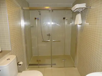 a shower with a glass door in a bathroom at The Hotel 592 - Adults Only in Barcelona