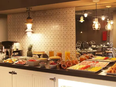 a buffet line with many different types of food at Axel TWO Barcelona 4 Sup - Adults Only in Barcelona