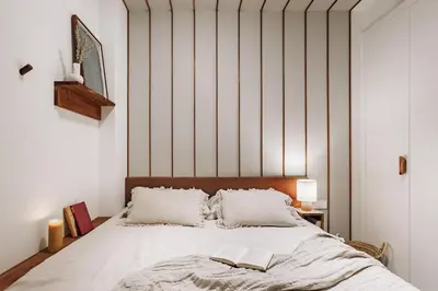 a bedroom with a large bed with a table on it at Mojacar - 2 bedrooms in Eixample Esquerra in Barcelona