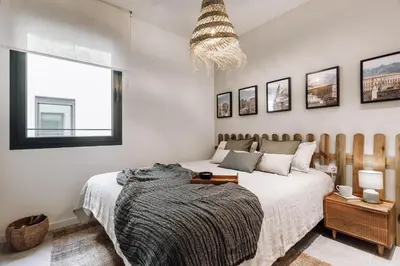 a dining room with a table and chairs at Botijo - 2 bedrooms in Eixample Esquerra in Barcelona