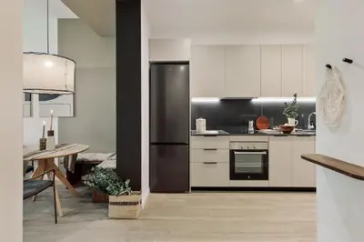 a living room with a couch and a table at Brisa - 1 bedroom and balcony in Sant Antoni in Barcelona
