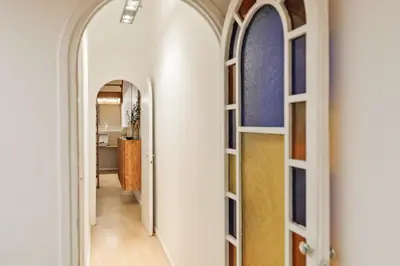 a kitchen with a table and a dining room at Panot - 2 bedrooms and terrace in Gràcia in Barcelona