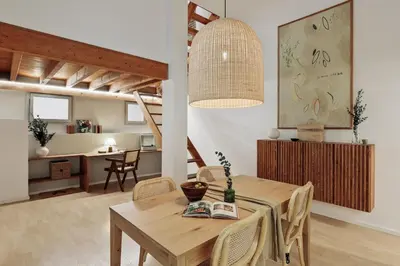 a kitchen with a dining room table and chairs at Panot - 2 bedrooms and terrace in Gràcia in Barcelona